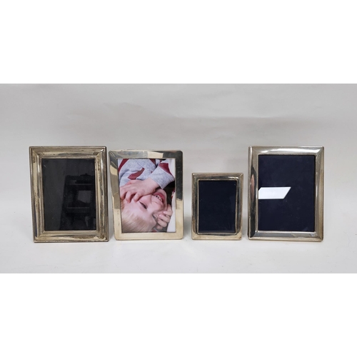 442 - Four contemporary silver rectangular photograph frames, all with easel backs, including Sheffield 19... 