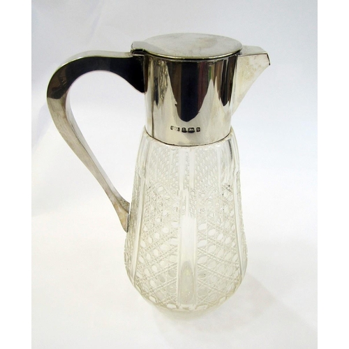 445 - Edwardian silver mounted cut class carafe having flat flush fitting lid, the tapered body with octag... 