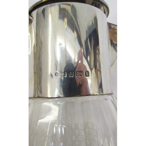 445 - Edwardian silver mounted cut class carafe having flat flush fitting lid, the tapered body with octag... 