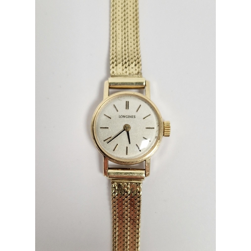 451 - Lady's 9ct gold manual wind Longines wristwatch, the silvered dial with baton hour markers, 9ct gold... 