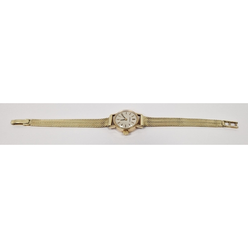 451 - Lady's 9ct gold manual wind Longines wristwatch, the silvered dial with baton hour markers, 9ct gold... 