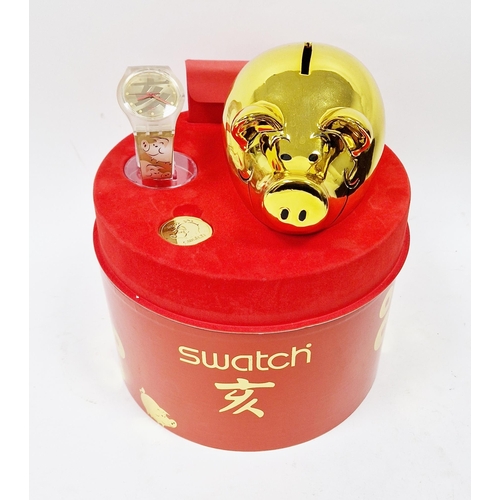 482 - Swatch 2007 Be Lucky wristwatch, with Pig decorated strap, in original box with Piggy bank and relat... 