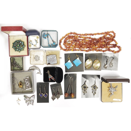 502 - Quantity costume jewellery to include rough cut amber bead necklaces, brooches and earrings (2 boxes... 