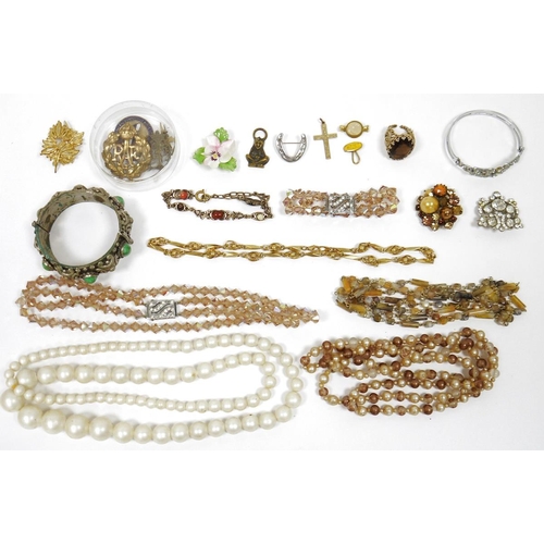 512 - RAF brass badge, three various simulated pearl necklaces, one having silver and marcasite clasp and ... 