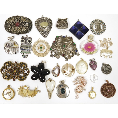 519 - Large quantity of costume jewellery to include brooches, necklaces, bangles etc. in wicker effect se... 