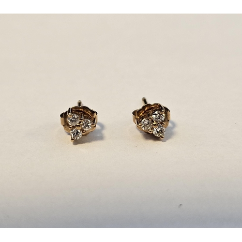 539 - Pair gold-coloured metal and white stone set earrings, each set three small white stones, probably d... 