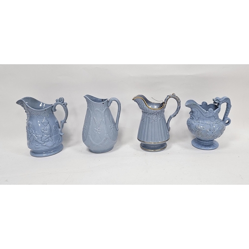 53A - Four 19th century stoneware moulded relief jugs with pale blue glaze, one with scenes of children pl... 