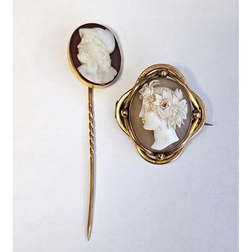 553 - 9ct gold cameo carved with head and shoulders of maiden, oval within scallop border, 3.5cm x 3cm app... 