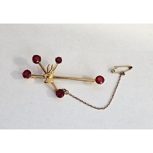 557 - 9ct gold antelope head mounted and red stone spray brooch