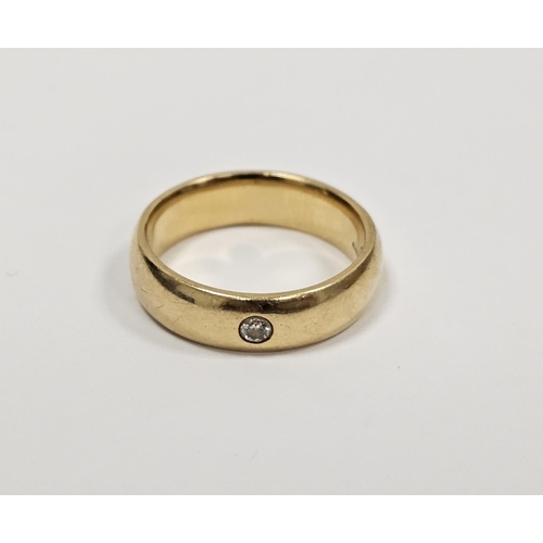 563 - 18ct gold and diamond ring the 18ct gold band set small diamond in rubover setting 11.3g total appro... 