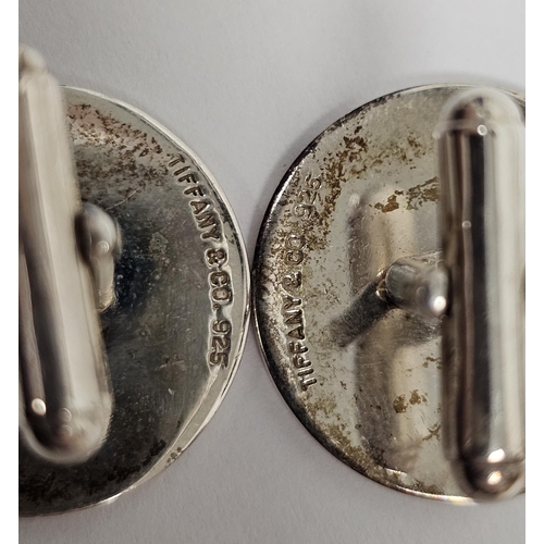 567 - Pair of Tiffany silver and enamel cufflinks each circular with enamel flags to the border initialled... 