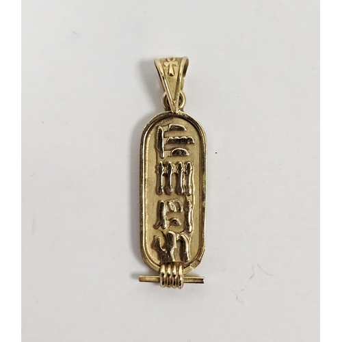 637 - Egyptian gold coloured metal pendant rounded rectangular decorated with hieroglyphics 3.2g approx