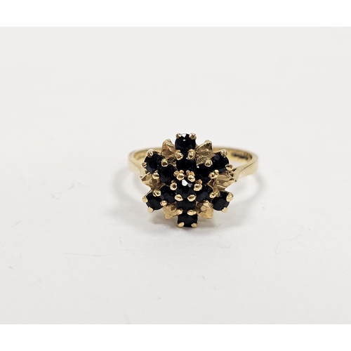 639 - 18ct gold and blue stone dress ring (flowerhead design) possibly sapphires size N