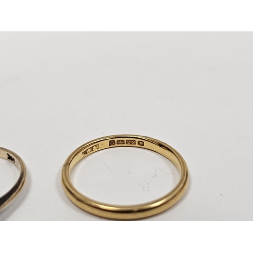 646 - 22ct gold wedding ring 2.5g approx and a 9ct gold and diamond three stone ring set three small stone... 