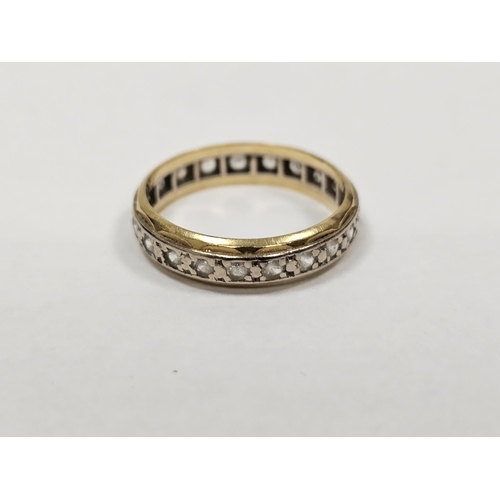 651 - 18ct gold and white stone eternity ring and two gold coloured metal further eternity rings, some wit... 