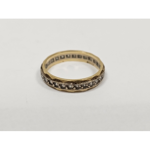 651 - 18ct gold and white stone eternity ring and two gold coloured metal further eternity rings, some wit... 