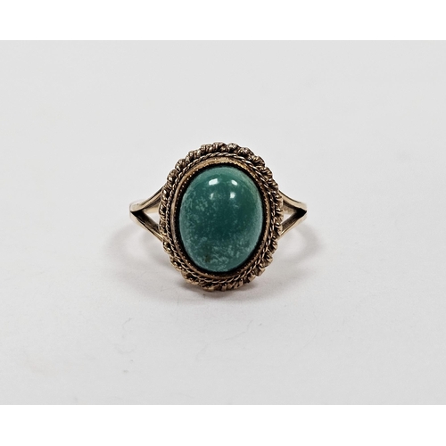 664 - 9ct gold and turquoise cabochon ring set single oval stone with rope twist surround. Ring size I, ap... 