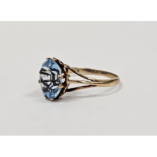 665 - 9ct gold and pale blue stone solitaire ring set oval facet cut stone, ring size L, approx 1.7g