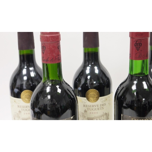 704 - Six bottles of Reserve des Tuguets 2006 Madiran and two of Chateau Saint Seurin 1990 Bordeaux (8)