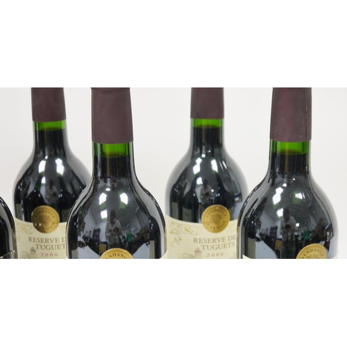 704 - Six bottles of Reserve des Tuguets 2006 Madiran and two of Chateau Saint Seurin 1990 Bordeaux (8)