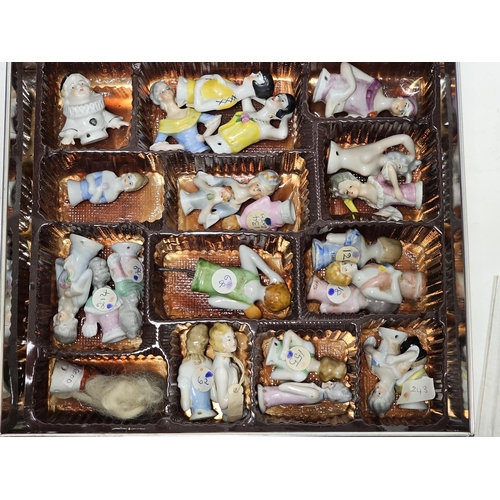 72 - LOT WITHDRAWN Extensive collection of porcelain pin cushion half dolls including flapper style, crin... 