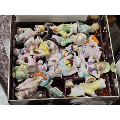 72 - LOT WITHDRAWN Extensive collection of porcelain pin cushion half dolls including flapper style, crin... 