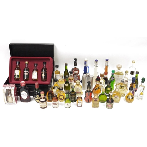 720 - A quantity of alcohol miniatures to include Montagues specially selected malt whisky, four in the bo... 