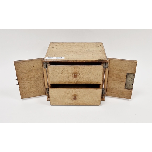 1006 - Late 19th/early 20th century fruitwood cabinet makers sample box, the two-door cupboard opening to r... 