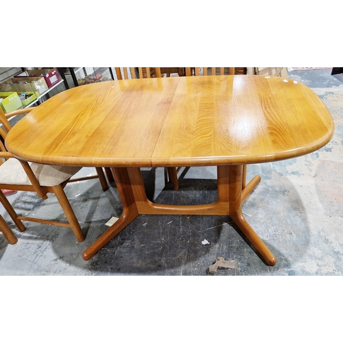 1249 - Mid century retro Danish dining room suite comprising an oval teak extending dining room table desig... 