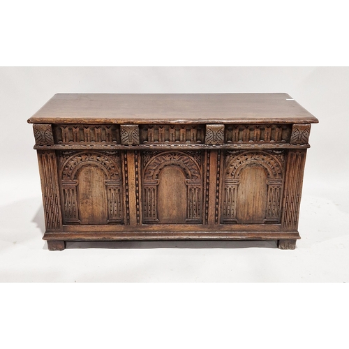 1258 - Reproduction oak coffer in the 17th century manner by Titchmarsh and Goodwin, the hinged lid opening... 