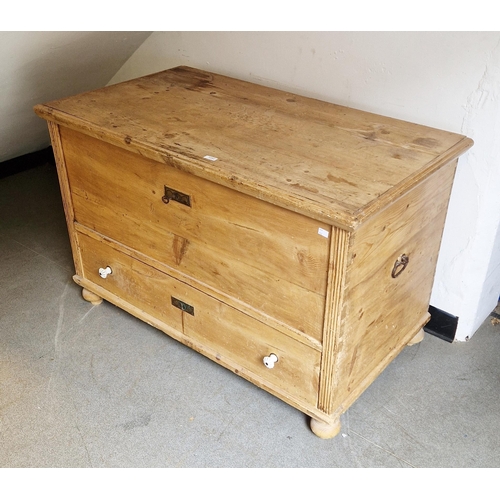 1262 - 19th century pine mule chest or coffer, the lid opening to a candle box and an open space, over a lo... 