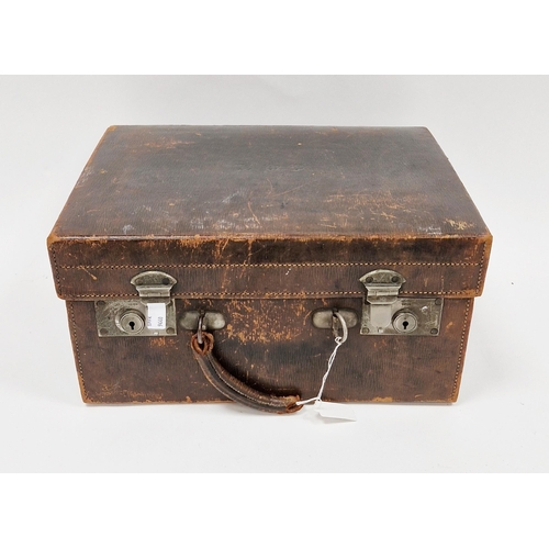 130 - Late 19th/early 20th century leather travelling dressing case, the hinged lid opening to a green fab... 