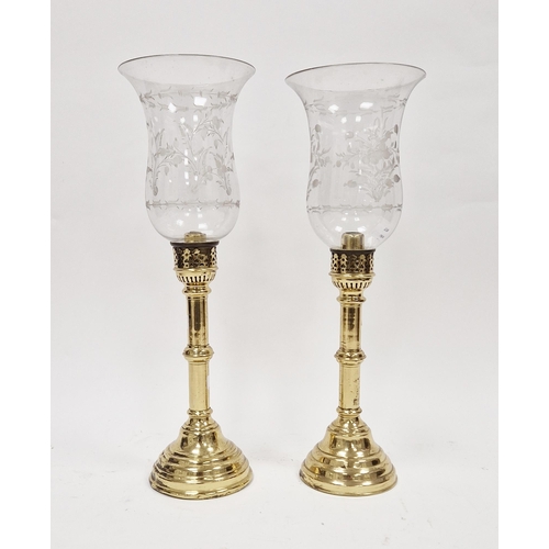 154 - Pair of late 19th/early 20th century brass storm lanterns with acid-etched glass shades, possibly Ru... 