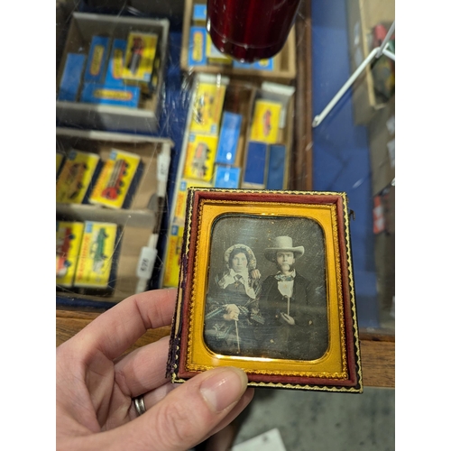 170 - Two 19th century cased daguerreotype photographs, one of two gentleman, and the other of a husband a... 