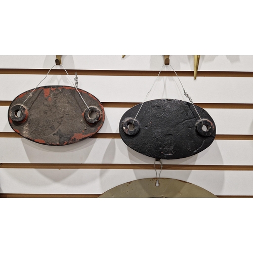 182 - Two mid century railway cast iron oval shedplates (shed plates), 83E and 83F, each 19cm long