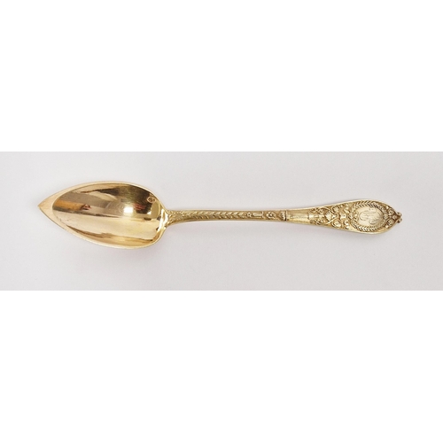 217 - Continental silver gilt set of twelve grapefruit spoons, indistinctly marked, housed in a Christofle... 