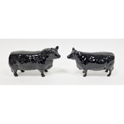 38B - Two Beswick Aberdeen Angus cows, each marked to underside 'Approved by the Aberdeen Angus Cattle Soc... 