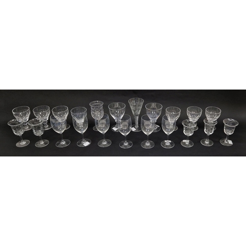 45 - Six Baccarat small wine glasses, an engraved airtwist in the 18th century style, 5 Webbs swagged sma... 