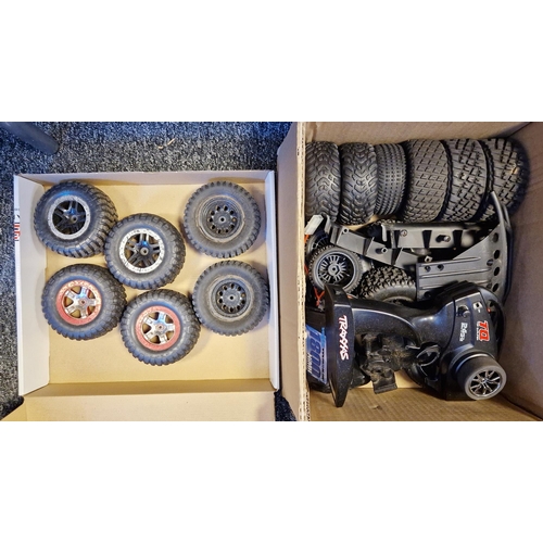 807A - Large quantity of radio controlled car accessories, spare parts and tools to include a Traxxas TQi c... 