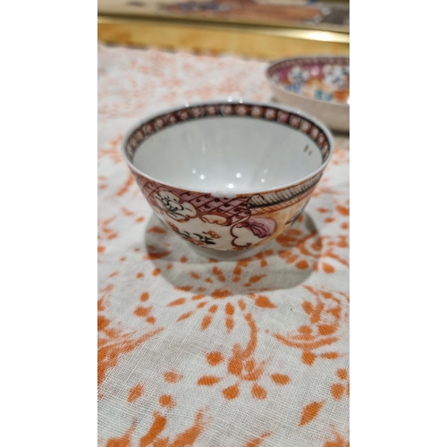 83 - Pair Chinese porcelain tea bowls and three matching saucers, all painted with famille rose colours w... 