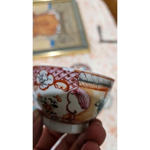 83 - Pair Chinese porcelain tea bowls and three matching saucers, all painted with famille rose colours w... 