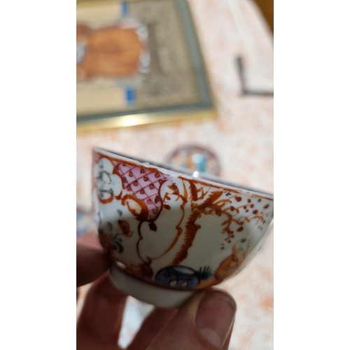 83 - Pair Chinese porcelain tea bowls and three matching saucers, all painted with famille rose colours w... 