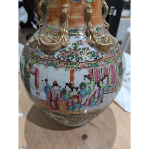 98 - 19th century Chinese Canton famille rose two-handled bottle-shaped vase, painted with figures in dis... 