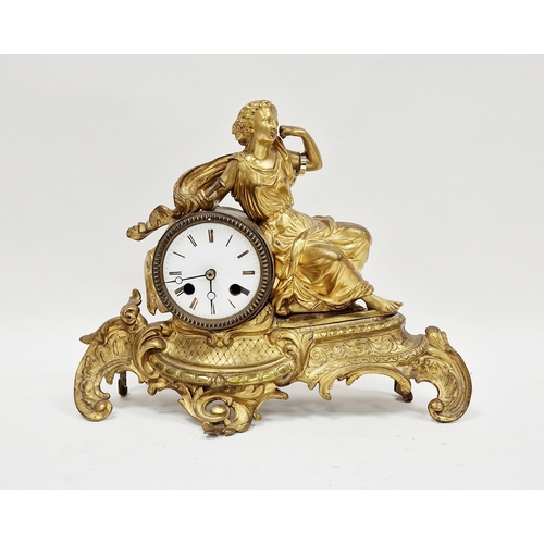 1003 - 19th / early 20th century gilt spelter mantel clock in the form of a classical female holding a horn... 