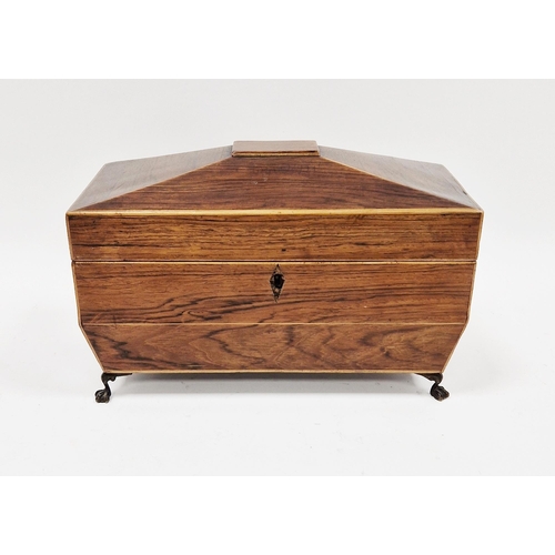 1004 - Regency rosewood and satinwood string inlaid tea caddy of sarcophagus form, the hinged lid opening t... 