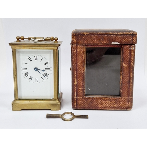 1011 - Late 19th / early 20th century gilt brass cased carriage clock with bevelled glass panels, the white... 