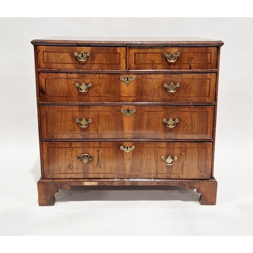 1058 - 18th century walnut chest of two short over three long graduating drawers, the top with broad cross-... 