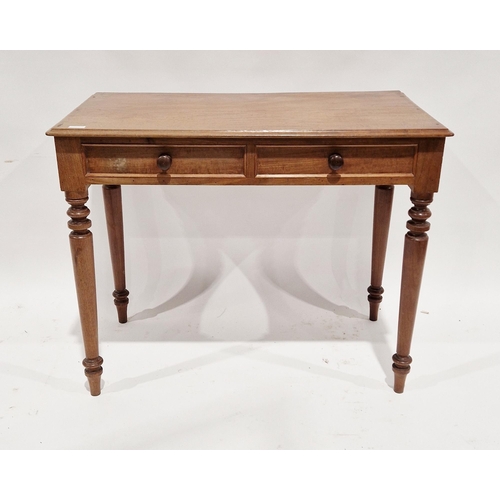 1063 - Victorian mahogany side table, the top with moulded edge above two frieze drawers and raised on turn... 