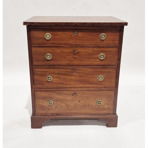 1101 - Reproduction Georgian mahogany small chest of four long drawers with brass ring drop handles and rai... 