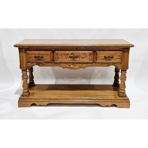 1119 - American Virginia House oak dresser base with three drawers over a pot shelf below and raised on tur... 